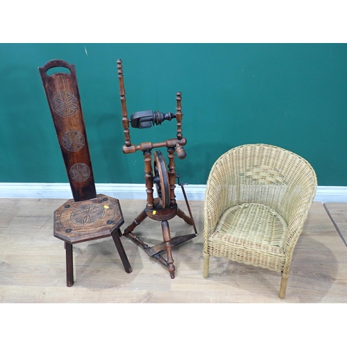 458 - A child's cane Armchair, a Spinning Stool and a Spinning wheel