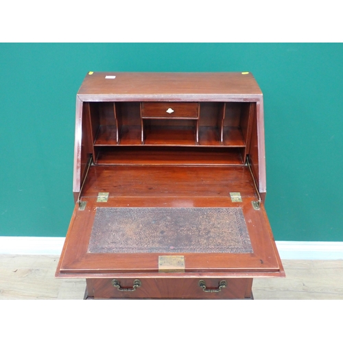 460 - A small mahogany Bureau on squared supports, 1ft 11in W A/F