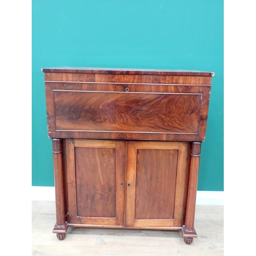 464 - A 19th Century mahogany Cabinet with hinged cover above a pair of cupboard doors, 2ft 9in W