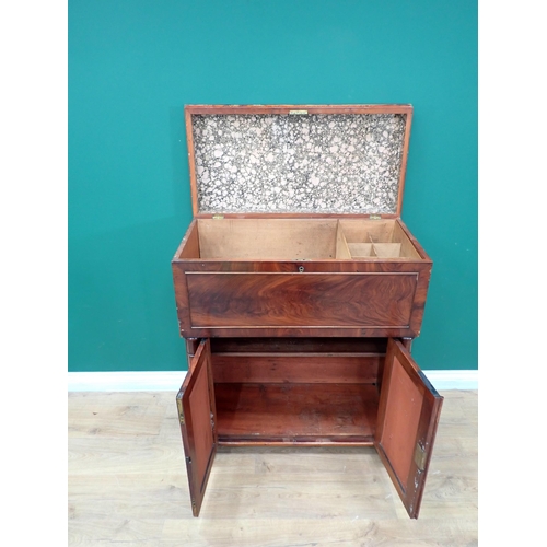 464 - A 19th Century mahogany Cabinet with hinged cover above a pair of cupboard doors, 2ft 9in W