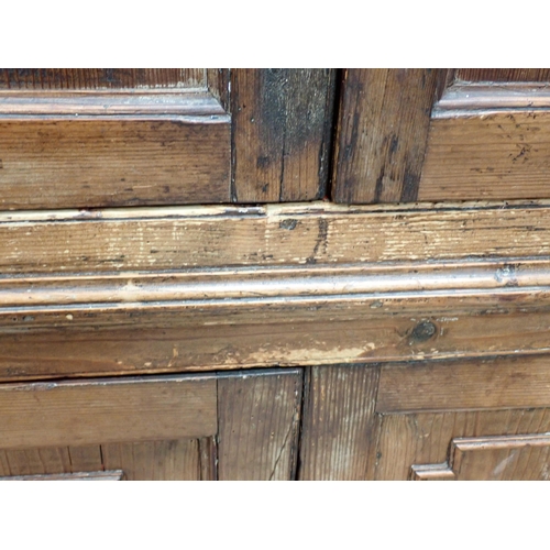 47 - A 19th Century pine barrel back Corner Cupboard fitted two pairs of moulded panelled doors 6ft 8in H... 