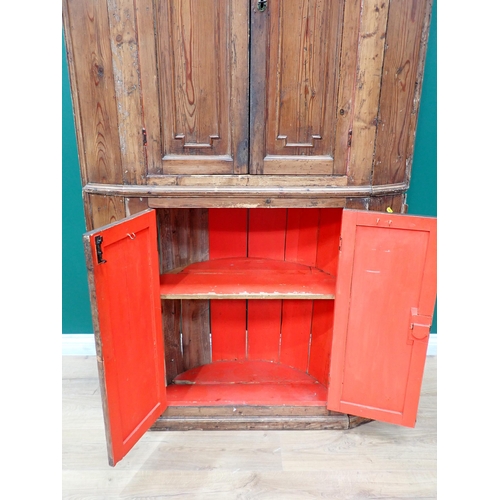 47 - A 19th Century pine barrel back Corner Cupboard fitted two pairs of moulded panelled doors 6ft 8in H... 