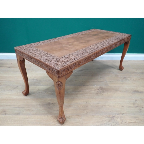 472 - An Eastern style carved Coffee Table, 3ft 8in