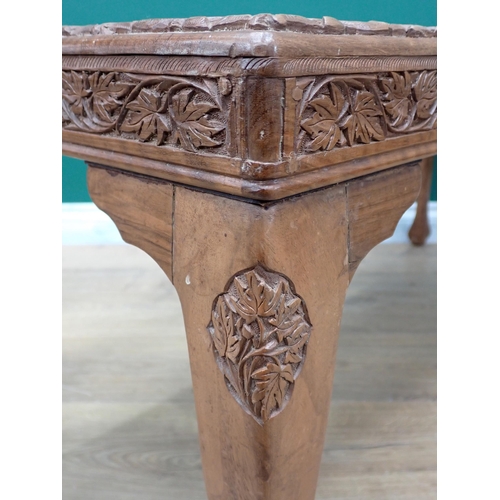 472 - An Eastern style carved Coffee Table, 3ft 8in