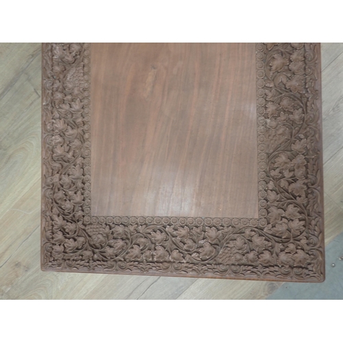 472 - An Eastern style carved Coffee Table, 3ft 8in