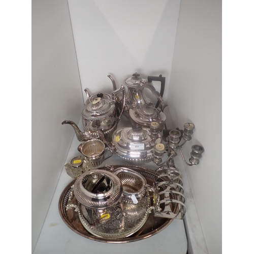 491 - A quantity of plated Items including Teapots, Coffee Pot, small Candelabra, Toastrack etc