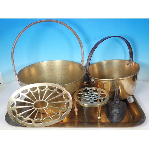 508 - Two antique brass Jam Pans, two Trivet Stands, a Tray and a Flat Iron