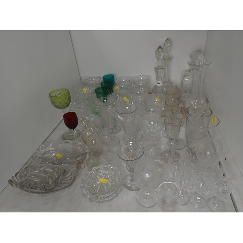 544 - A quantity of glassware including Decanters, Champagnes and Liquor Glasses