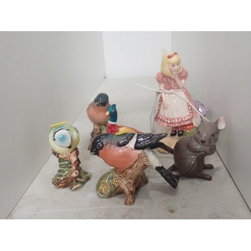 586 - A Royal Doulton 'Alice', Beswick Bullfinch, Chaffinch, Blue Tit, Pheasant and Mouse