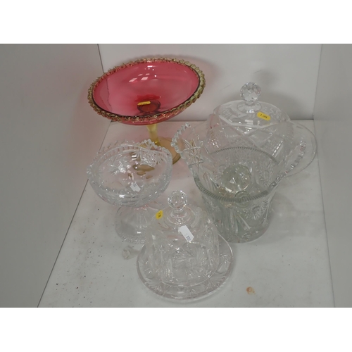 589 - A cranberry and amber glass Tazza, cut glass Cheese Dish and Cover, Champagne Bucket, pedestal Bowl ... 