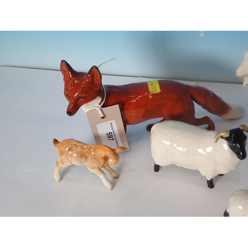 597 - A Beswick Fox, two Goats and a Kid, two Scottish Blackface Sheep and Lamb