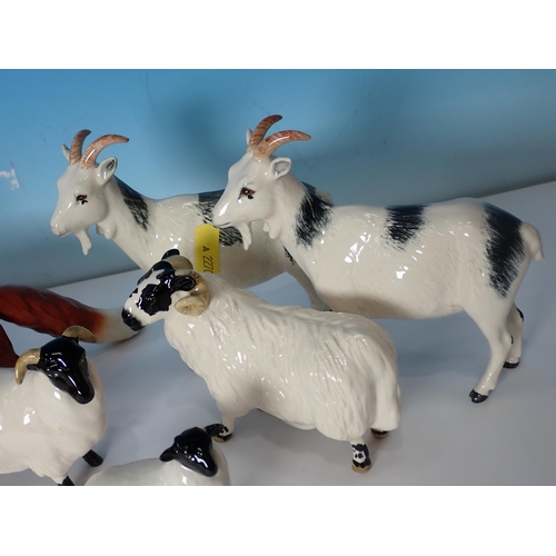 597 - A Beswick Fox, two Goats and a Kid, two Scottish Blackface Sheep and Lamb