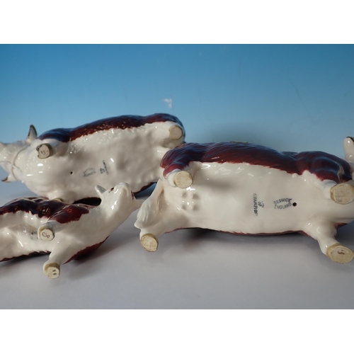 598 - A Beswick Hereford Bull, Cow and Calf