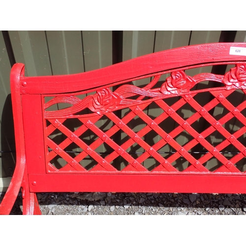 628 - A red painted Garden Bench with metal lattice back, scroll ends and wooden slats 4ft 3in W x 2ft 10i... 