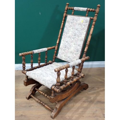 651 - An upholstered American style Rocking chair