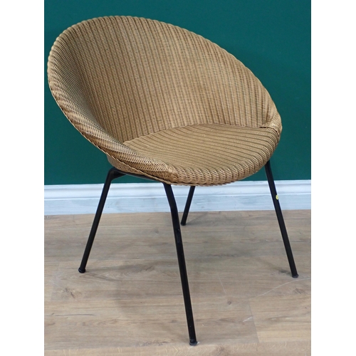 656 - A Lloyd Loom Lusty Chair with metal base