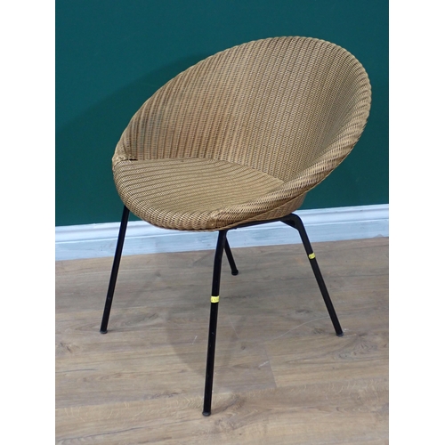 656 - A Lloyd Loom Lusty Chair with metal base