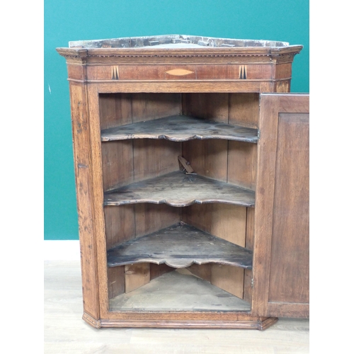 665 - A Georgian oak and inlaid hanging Corner Cupboard 3ft 7in H x 2ft 10in W