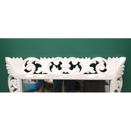 67 - A Wall Mirror with carved and white painted  oak frame 3ft 8in H x 3ft W