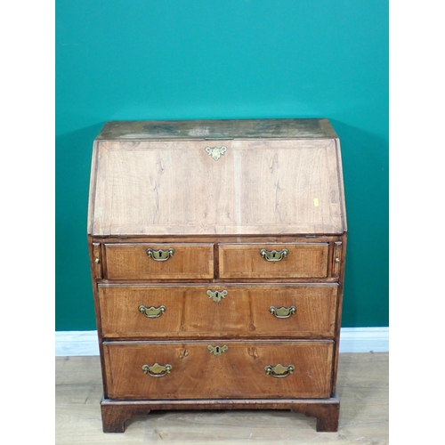 681 - An 18th Century walnut Bureau, the sloping front enclosing a fitted interior above two short and two... 