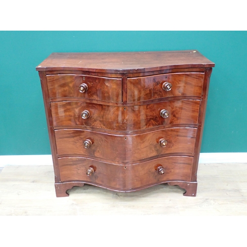 69 - A 19th Century serpentine fronted Chest of two short and three long drawers mounted on ogee bracket ... 