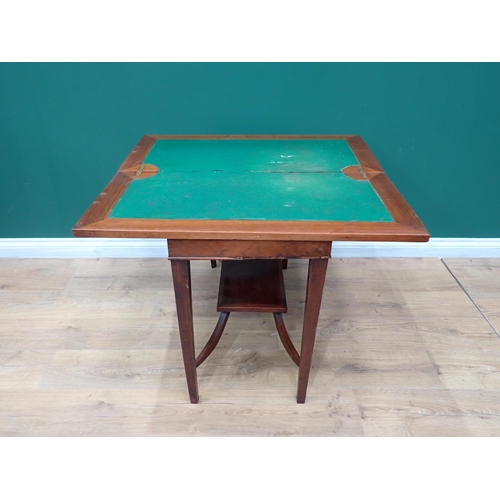 70 - A mahogany fold over Card Table on square cut tapering supports 2ft 11in W x 2ft 3in H