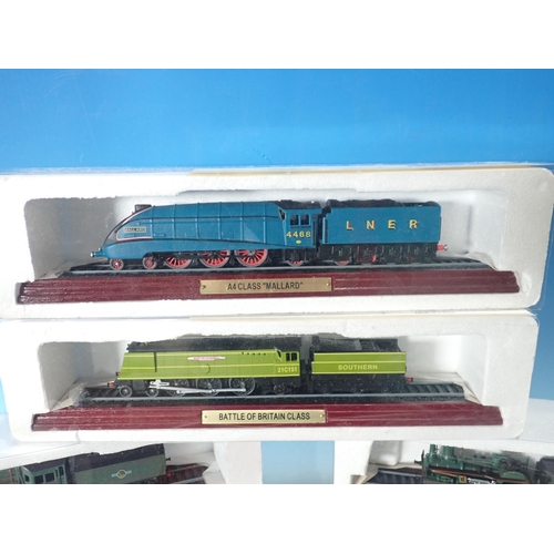 716 - Two boxes of model steam Trains and tenders and a miniature Violin