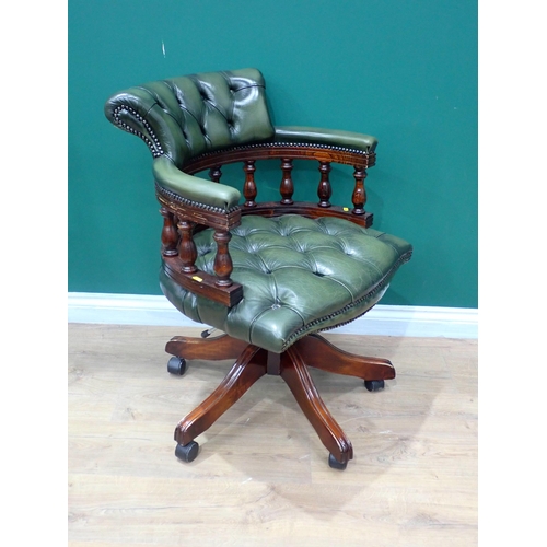 776 - A green leather covered swivel Office Chair