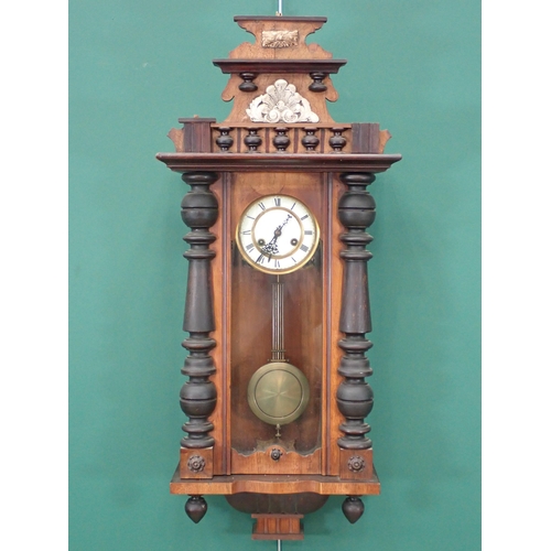 779 - A walnut cased American Wall Clock