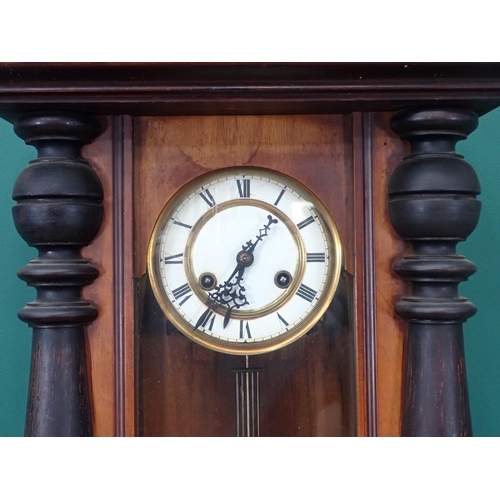 779 - A walnut cased American Wall Clock