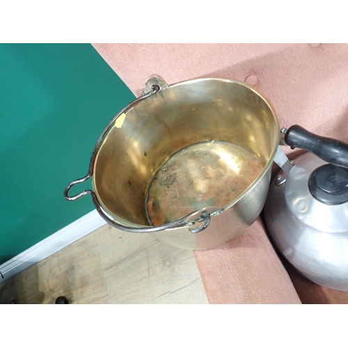 781 - Two stove Kettles, a Jam Pan and two scallop shaped Dishes