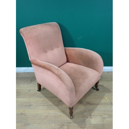 782 - A 19th Century pink upholstered Armchair on turned mahogany front supports