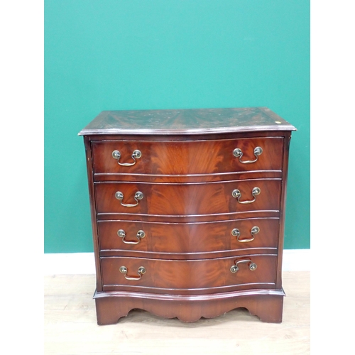 80 - A mahogany veneered serpentine fronted Chest of four drawers 2ft 7in H x 2ft 5in W