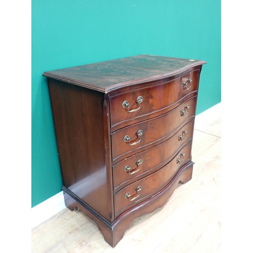 80 - A mahogany veneered serpentine fronted Chest of four drawers 2ft 7in H x 2ft 5in W