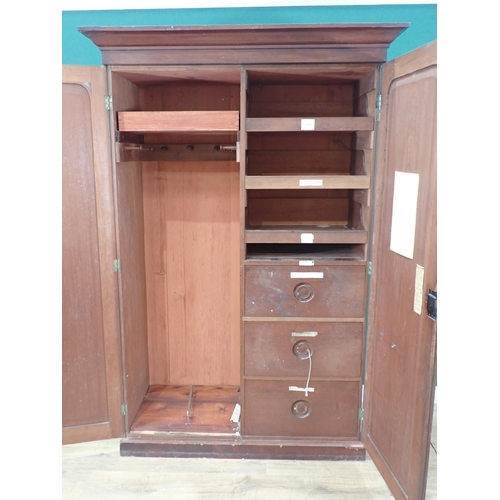 805 - A Victorian mahogany Wardrobe fitted pair of doors enclosing linen slides and three drawers