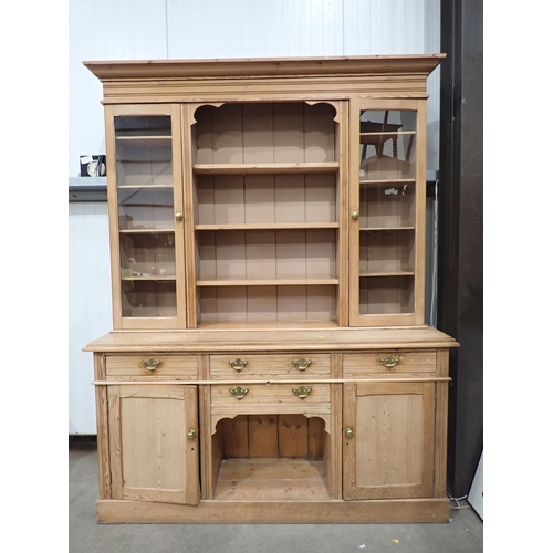 813 - A Victorian pine Dresser fitted pair of glazed doors flanking shelves above dog kennel base fitted f... 