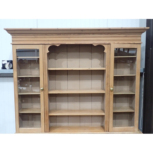 813 - A Victorian pine Dresser fitted pair of glazed doors flanking shelves above dog kennel base fitted f... 