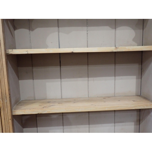 813 - A Victorian pine Dresser fitted pair of glazed doors flanking shelves above dog kennel base fitted f... 