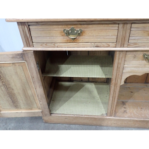 813 - A Victorian pine Dresser fitted pair of glazed doors flanking shelves above dog kennel base fitted f... 