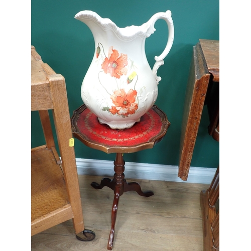 82 - A Singer Sewing Machine on stand, an oak Tea Trolley and a Wash Jug and Bowl