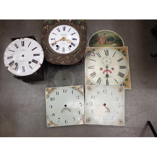 823 - Three boxes of Longcase Clock Parts and part of an oak case, also faces and weights