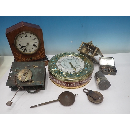 831 - A walnut Mantel Clock and box of clock parts