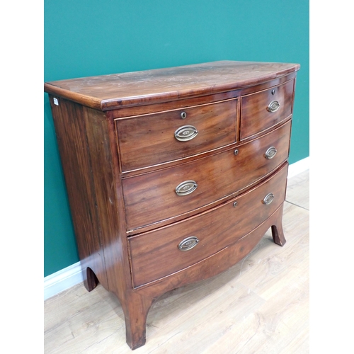 84 - A Georgian mahogany bow fronted Chest of two short and two long drawers mounted on splayed feet 3ft ... 