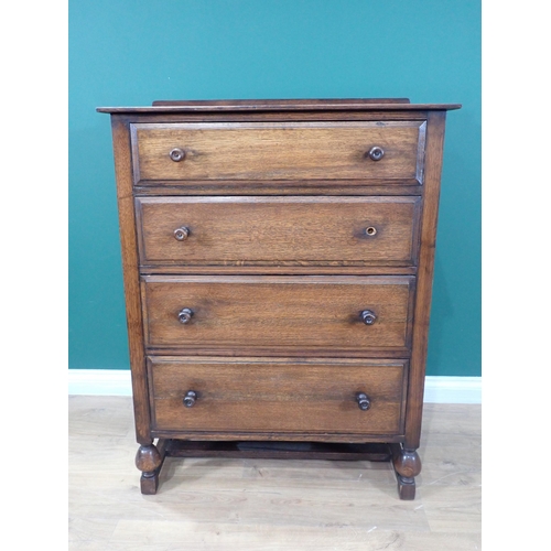 90 - An oak Chest of four drawers and a Dressing Chest fitted two drawers