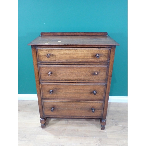 90 - An oak Chest of four drawers and a Dressing Chest fitted two drawers