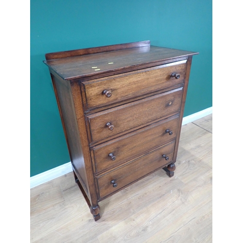 90 - An oak Chest of four drawers and a Dressing Chest fitted two drawers