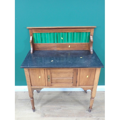 92 - An Edwardian walnut tile back Washstand fitted single cupboard door on turned supports 3ft 7in H x 3... 