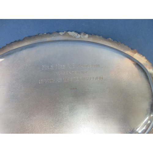 93 - An Indian sterling silver oval Dish with foliate border and presentation inscription, 550 gms, 11 x ... 