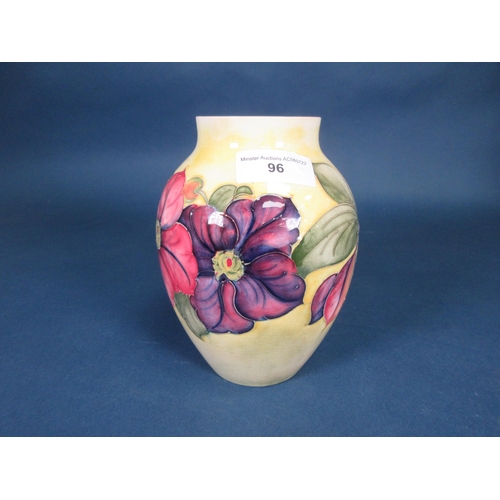 96 - A Moorcroft ovoid Vase with floral decoration on a yellow ground, 7in