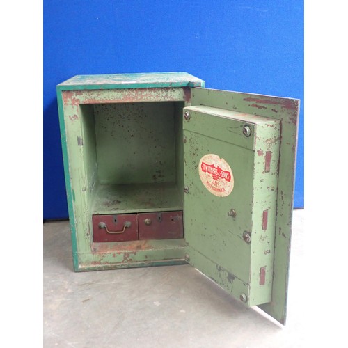 832 - A T. Withers & Son cast iron Safe with key 2ft 4in H x 1ft 8in W